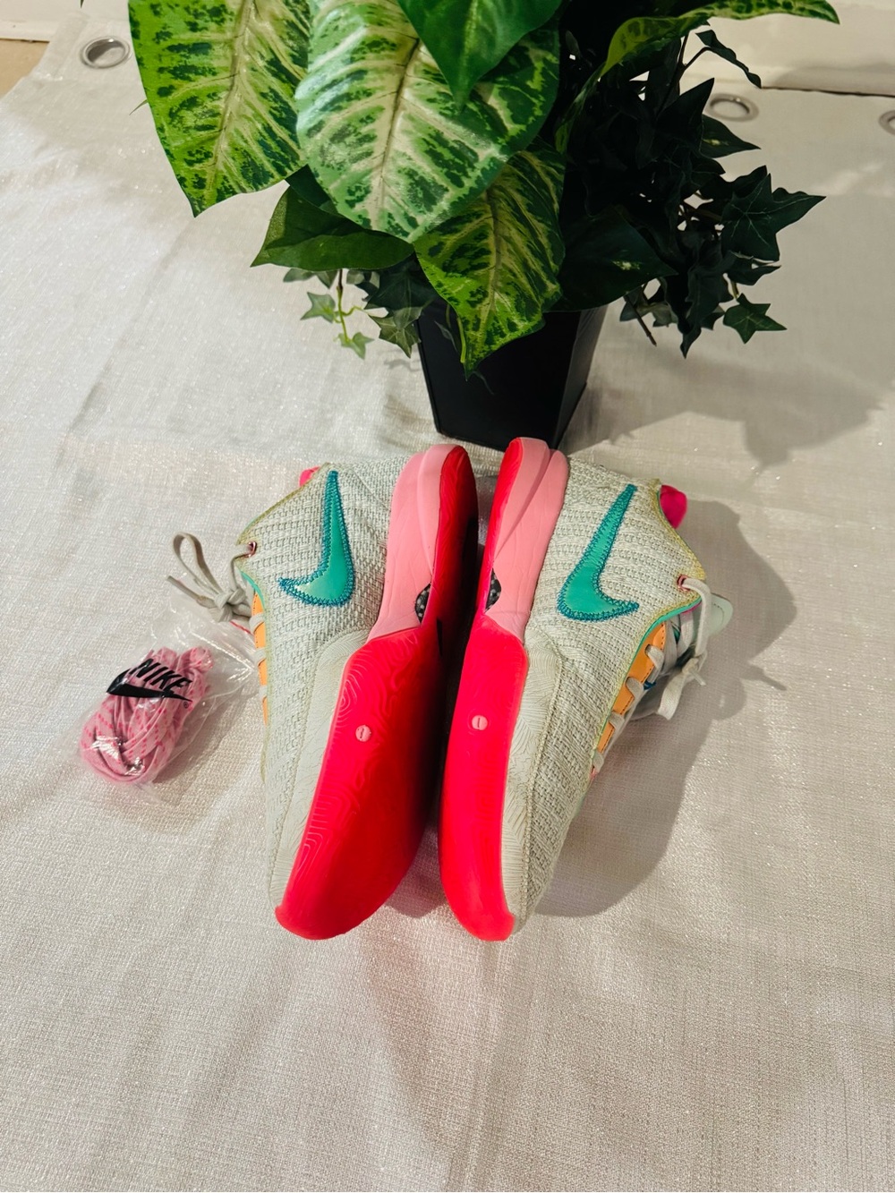 Nike Women’s Teal Swoosh Running Shoes with Pink Soles